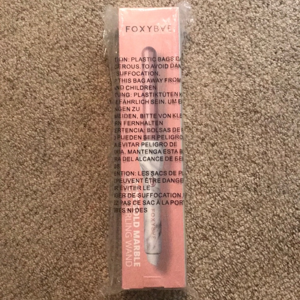 Foxybae rose gold 25mm curling wand.